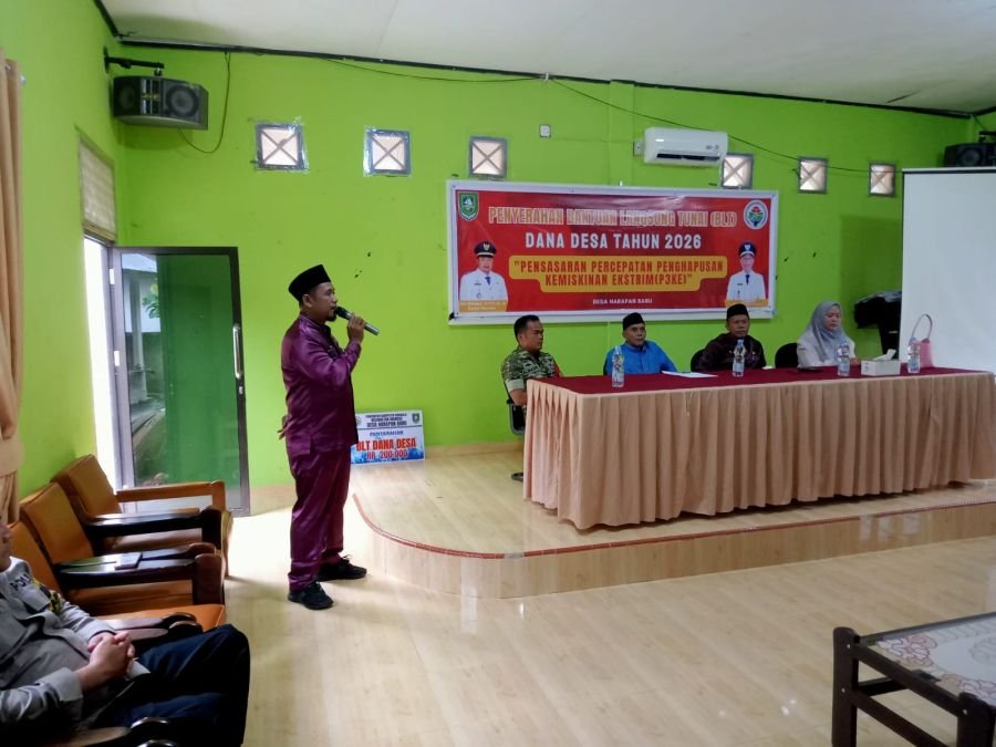 Babinsa Hadiri Penyerahan BLT Tahun Anggaran 2026 di Desa Harapan Baru