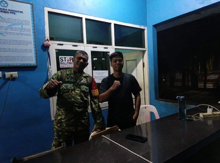 Babinsa Koramil 05/Sail Tingkatkan Kewaspadaan Warga Lewat Patroli Malam