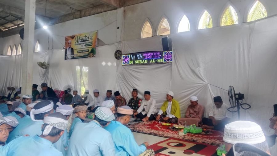Babinsa Koramil 06/KTM Hadiri Peringatan Maulid Nabi Muhammad SAW di Desa Penjuru