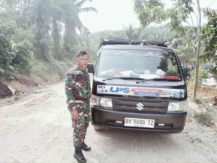 Babinsa Koramil 07 Tenayan Raya Monitor Pengamanan Aktivitas Transdepo DLHK Pekanbaru