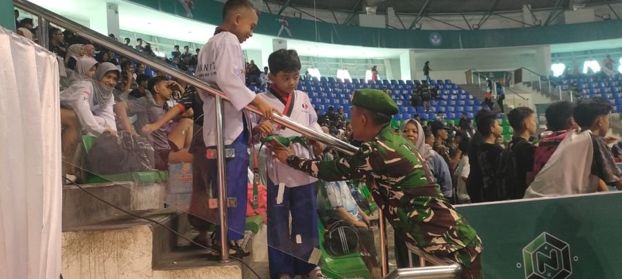 Babinsa Tanjung Rhu Dampingi Andy Hadapi Turnamen Taekwondo Piala Pangdam XIX/Tuanku Tambusai