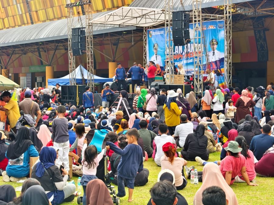 Danramil 01/Rumbai Bersama Warga Ramaikan Jalan Santai dan Senam Massal HUT Kota Pekanbaru