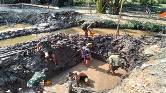Kodim 0301/Pekanbaru dan Warga Satukan Langkah Bangun Jembatan Garuda