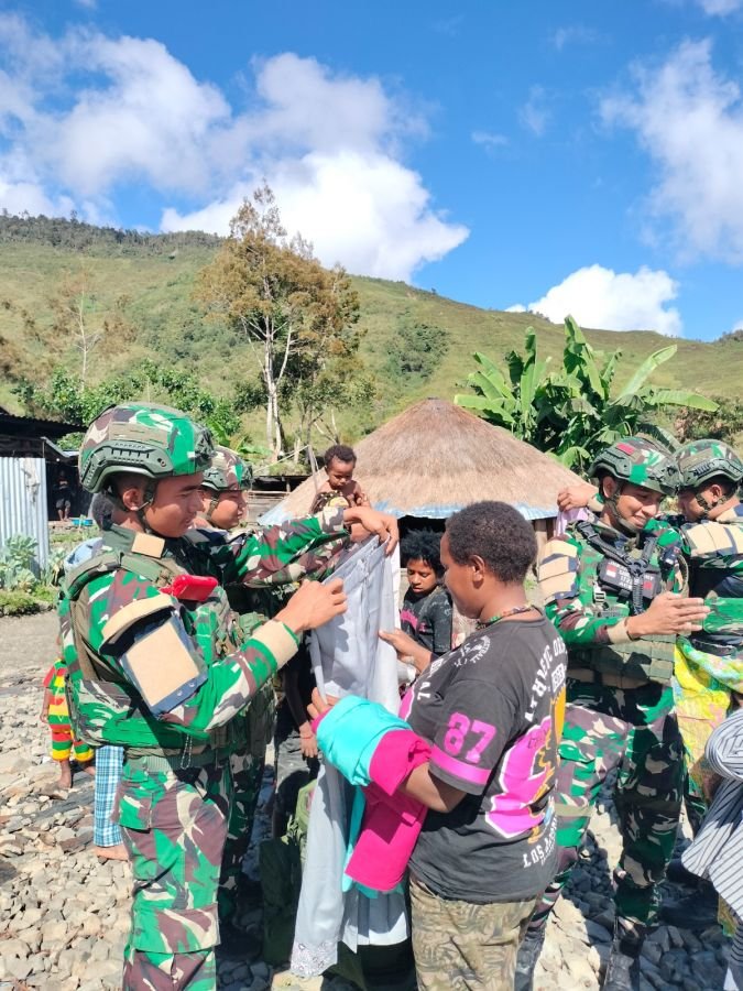 PELAYANAN KESEHATAN KELILING SATGAS YONIF 136/TUAH SAKTI DI WILAYAH POS KP 55