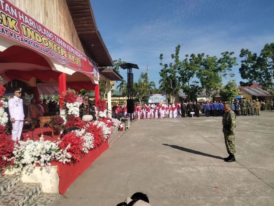 HUT RI ke-81 di Ujung Batu, TNI dan Warga Khidmat Kibarkan Merah Putih