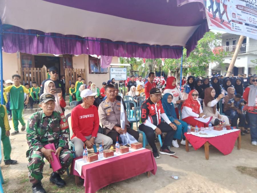 Semarak HUT RI Ke 81: Serda Erwin Savitri Hadiri Lomba Gerak Jalan Santai Di Sapat
