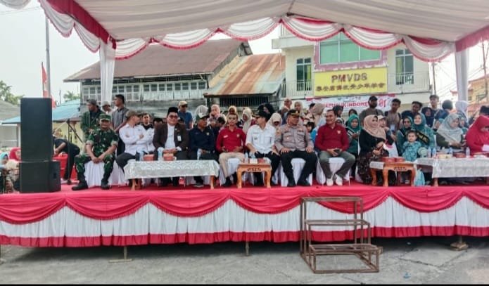 Sertu Faisal Kawal Karnaval HUT RI, Semangat Pelajar Penuhi Jalan Tanjung Batu