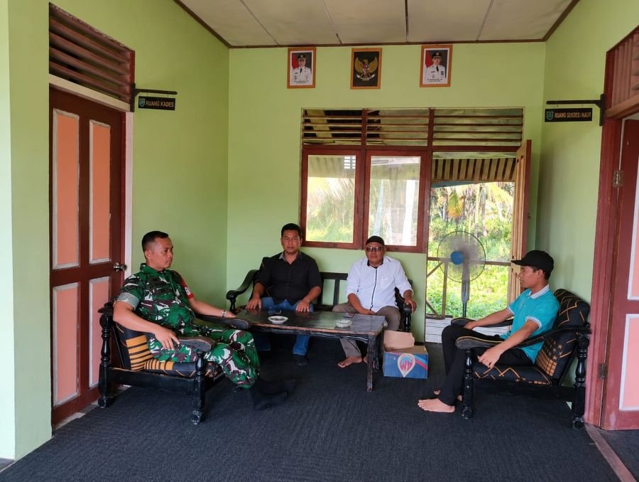 Sinergi Diperkuat: Serda M Tahir Komsos Dengan Perangkat Desa Dan Mitra Karib Sungai Terab